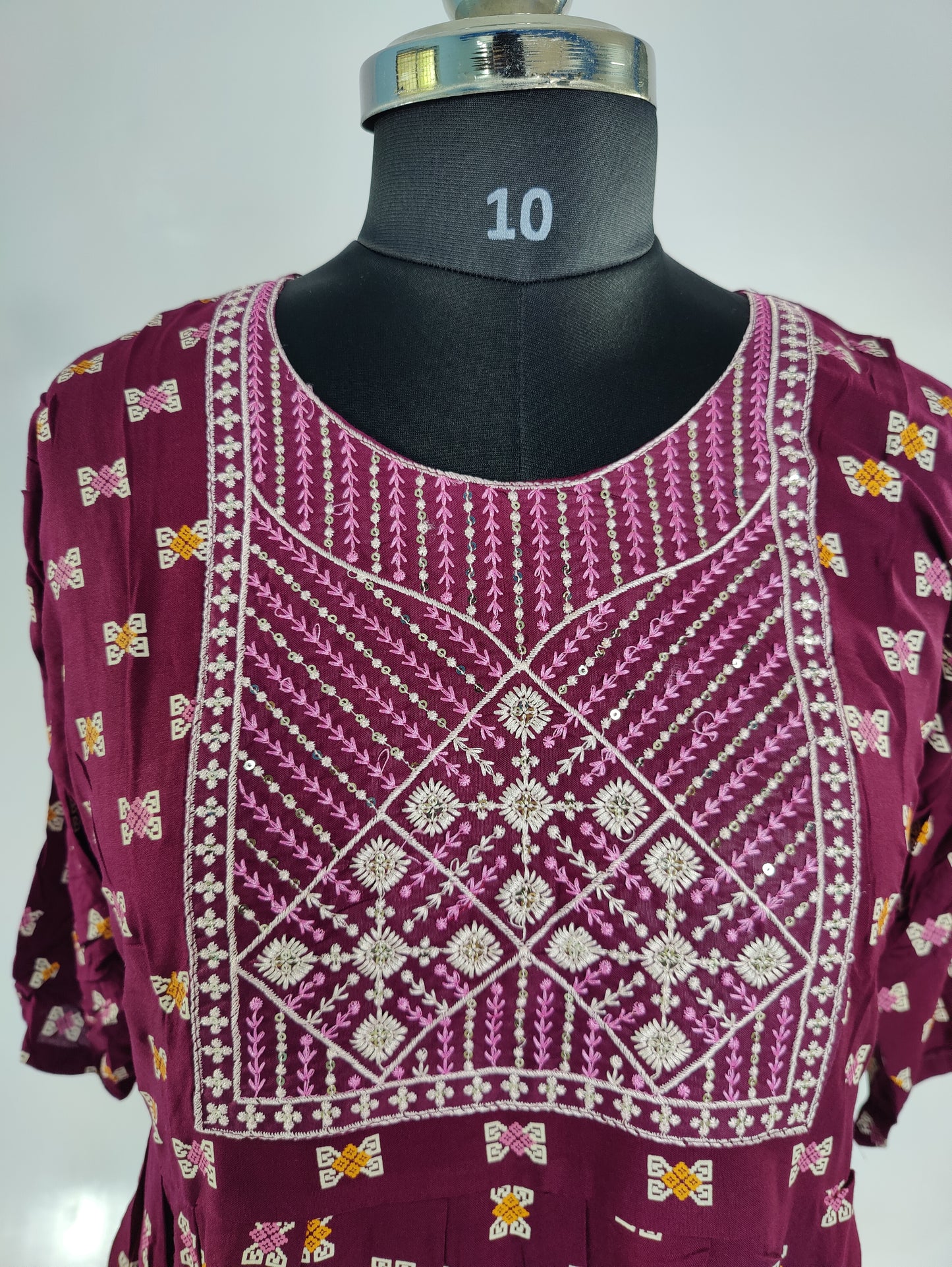 Embroidered Elegance: Maroon Ikat Kurta with Pleated Detail