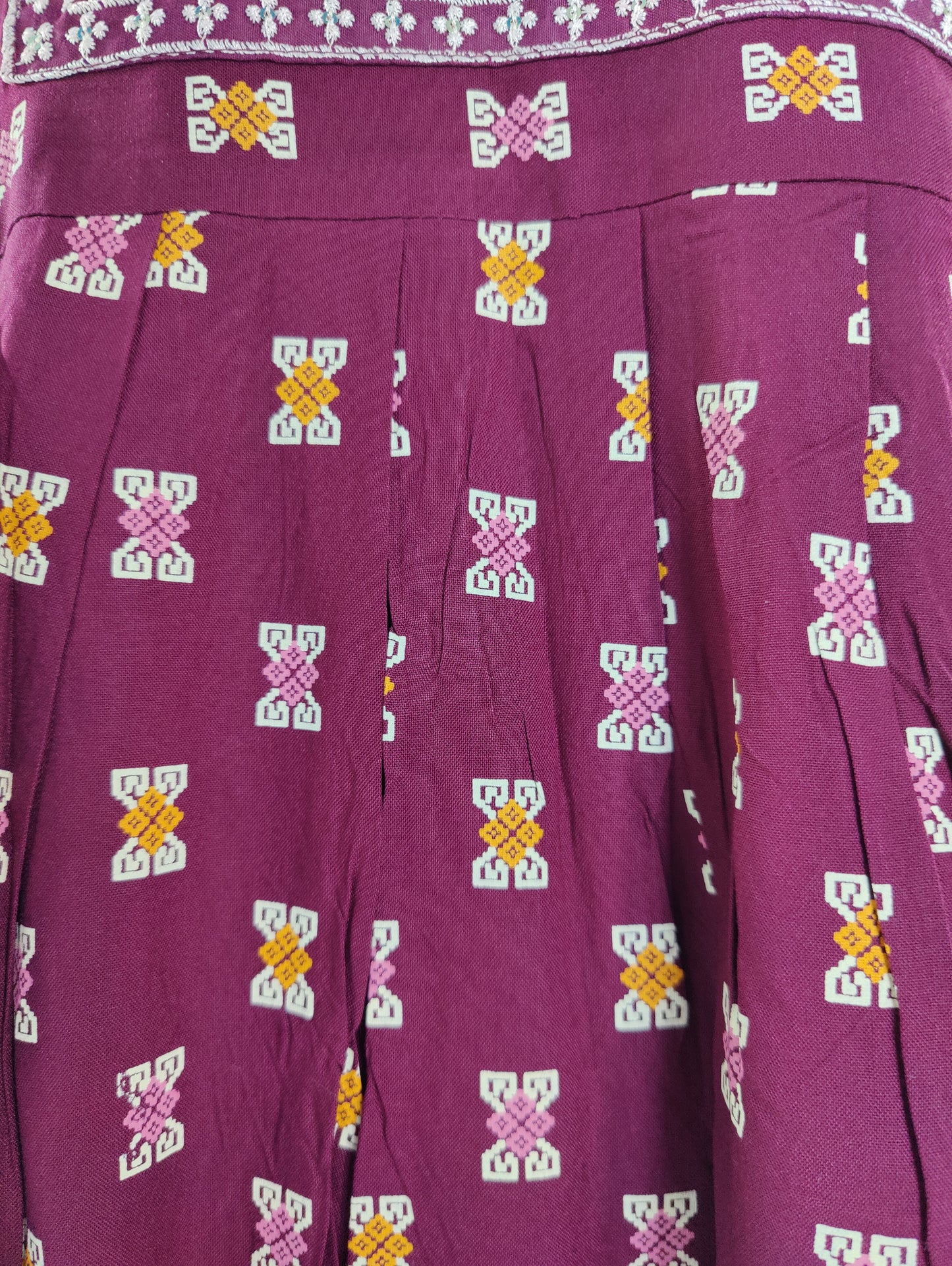 Embroidered Elegance: Maroon Ikat Kurta with Pleated Detail