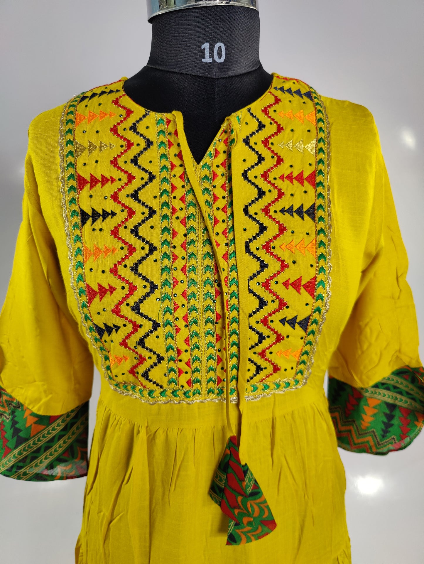 Sun-Kissed Elegance: Mustard Yellow Embroidered Kurti with Tiered Hem