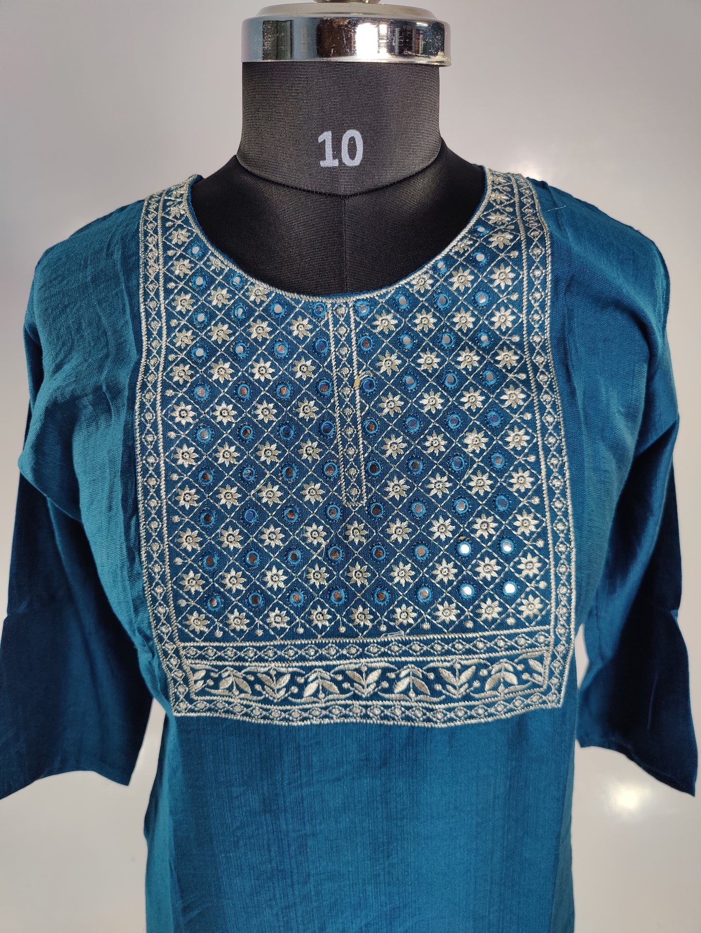 Elegant Embellishment: Teal Kurti with Silver Embroidered Neckline