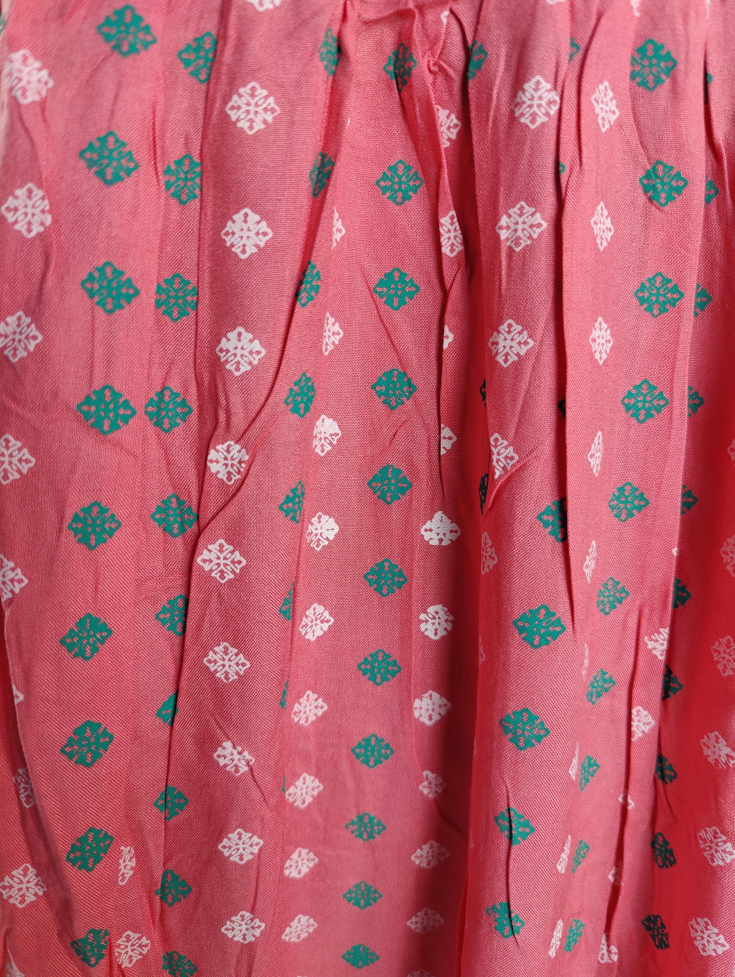 Delicate Charm: Pink Kurti with Embroidered Neckline