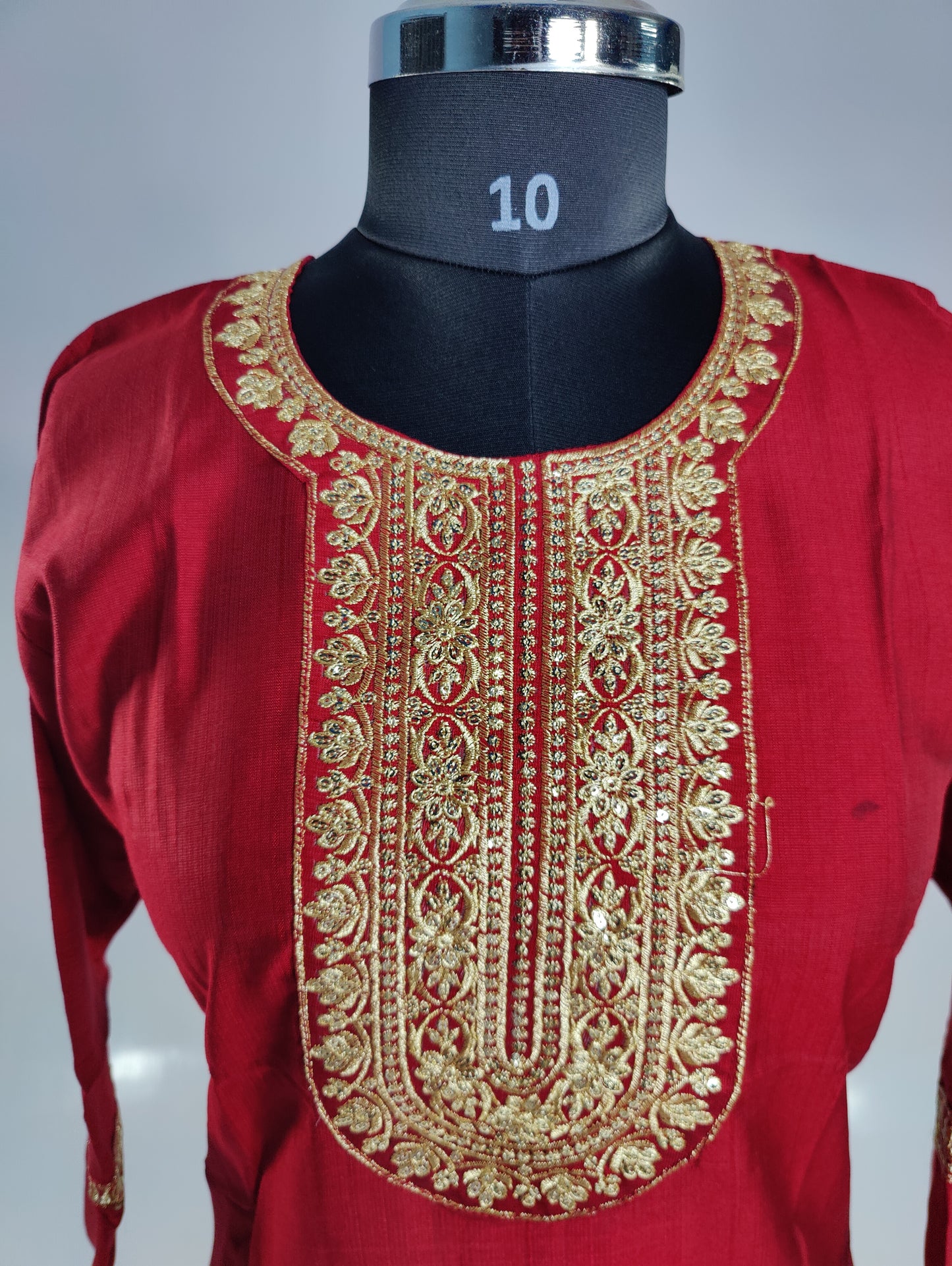Royal Radiance: Maroon Kurti with Golden Embellishments